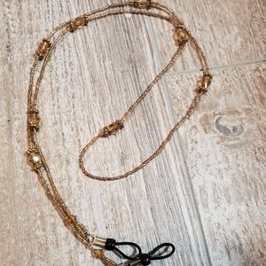 Beaded eye glass holder